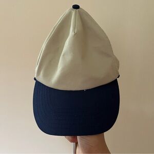 Tan and navy blue baseball cap gorpcore outdoor granola sporty golf hiking bloke